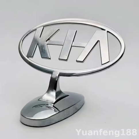 ЭМБЛЕМА НА КАПОТ ПРИЦЕЛ KIA фото 1